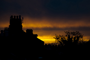 The sun sets over the rooftops of the houses on Leinster Road, Dublin. 3rd February 2014